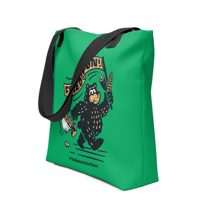 Green Fair Bear "Fried Fun!" tote bag with black handles. Design of cartoon bear with cookies, corn dog, and roasted corn waving a "Friend Fun!" banner side view.