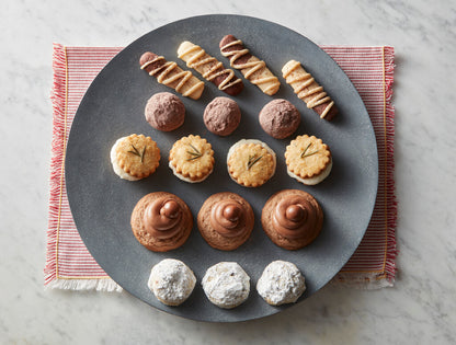 The winner and finalists from 2021 Star Tribune Holiday Cookie Contest (from top): Tiramisu Twists, Diablo Snowballs, Lemon Rosemary Cremes (winner), Malted Milk Ball Cookies, Buttery Blueberry Buttons.